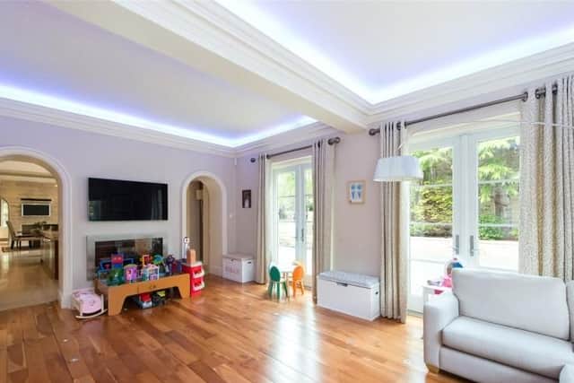 New owners can relax in the spacious cinema room.