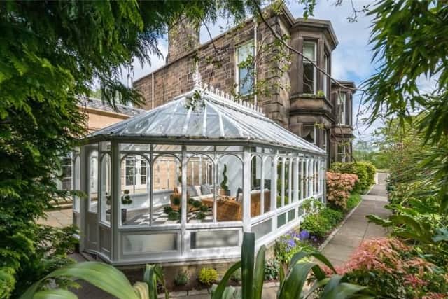 The conservatory leads out to the large garden.