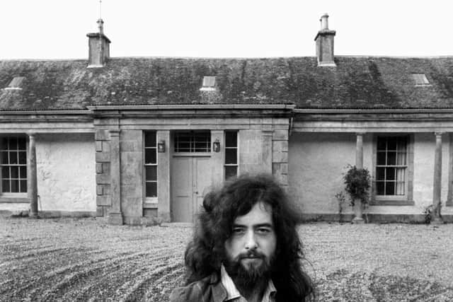Led Zeppelin guitarist Jimmy Page outside Boleskine House, which he bought in the early 1970s. PIC: Douglas Corrance/The Scotsman.