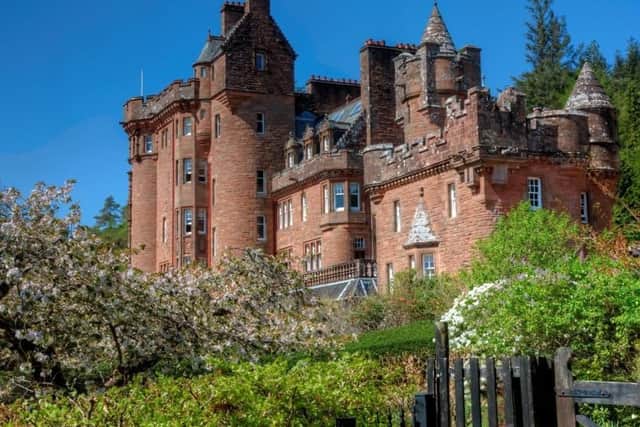 On the castle's south front the ground floor opens onto a balustrade terrace.