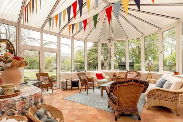 New owners can enjoy sunny days in the conservatory, which leads out to the garden.