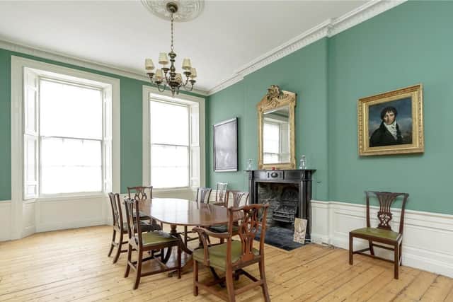 The formal dining room also has a feature fireplace.