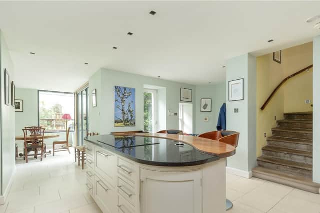 There's ample storage space in the kitchen island.