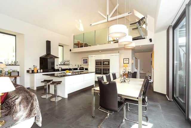 The open plan living area with sliding doors to the terrace.