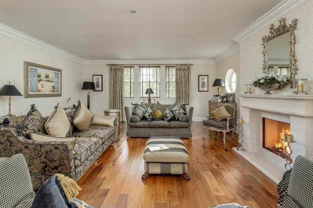 The drawing room has a large fireplace.