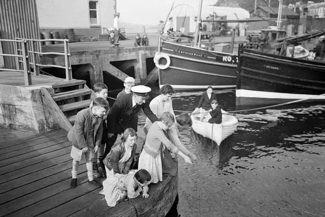 Children fishing during the Glasgow Fair Holidays in 1956. (Picture: TSPL)