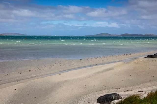 The house sits within walking distance of a beautiful, white sandy beach.