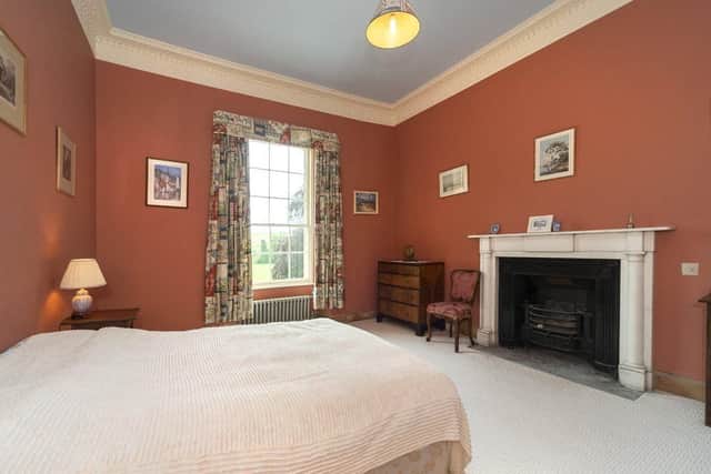 One of the eight bedrooms.