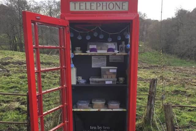 In a bid to save their traditional red phone box, local girls Holly Ford and Bron Campbell open a tiny cake shop - Cakes in the Call Box. Located in Cladich, Argyll, visitors can pick what they like and pay via an honesty box.