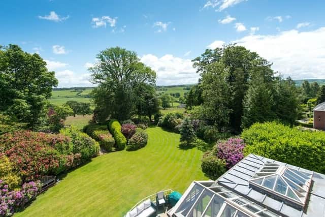 The property has landscaped grounds, woodland and grass paddocks as part of its approx. 70 acres.