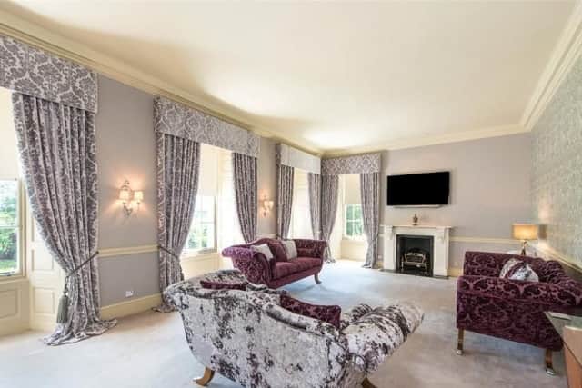 New owners can entertain guests in this contemporary living room.