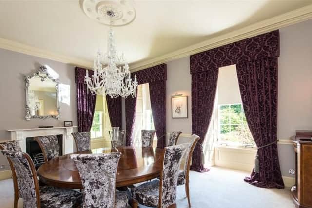 The formal living room also has a dining area.