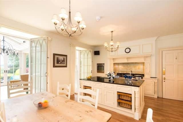 The kitchen has a dining area - ideal for family gatherings.
