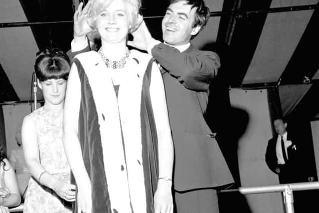 Scottish actor John Cairney crowns Valerie Riddell, the winner of the Coal Queen beauty contest at the Scottish Miners Gala Day, held at Leith Links in Edinburgh, June 1966.