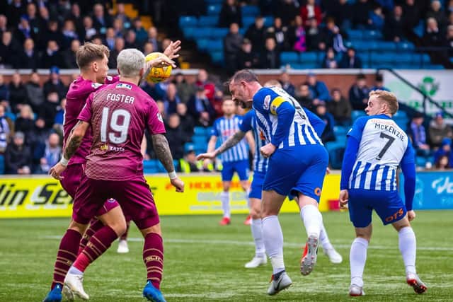 If the ball touches a players hand/arm when it is above their shoulder (unless the player has deliberately played the ball which then touches their hand/arm) a penalty or free-kick will be given.