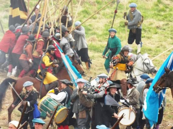 A re-enactment of the  Battle of Dunbar with the 1650 encounter leading to and estimated 1,400 Scots soldiers being transported to the colonies as indentured servants. PIC: Scottish Battlefields Trust.