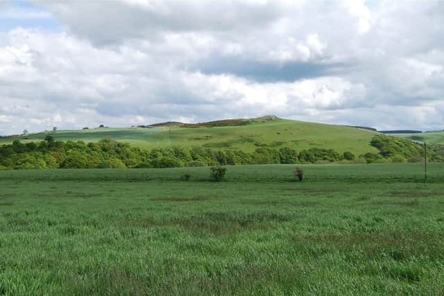 There is extensive land which comes with this modern farmhouse, and offers business potential.