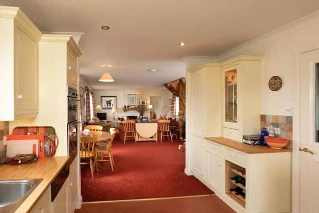 The open-plan kitchen/living area in the house.