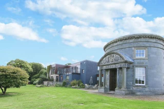A capital home complete with a 260-year-old temple and links to Hitlers deputy Rudolf Hess offers buyers a rare chance to purchase a unique property within easy reach of Edinburgh city centre.The 6 bedroom property combines a luxurious modern house attached to a two-storey temple built in 1759.