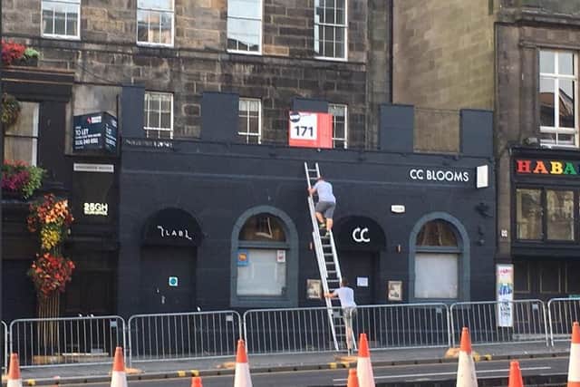 Venues begin taking down their Fringe venue signs - sometimes even before the Festival has actually finished.