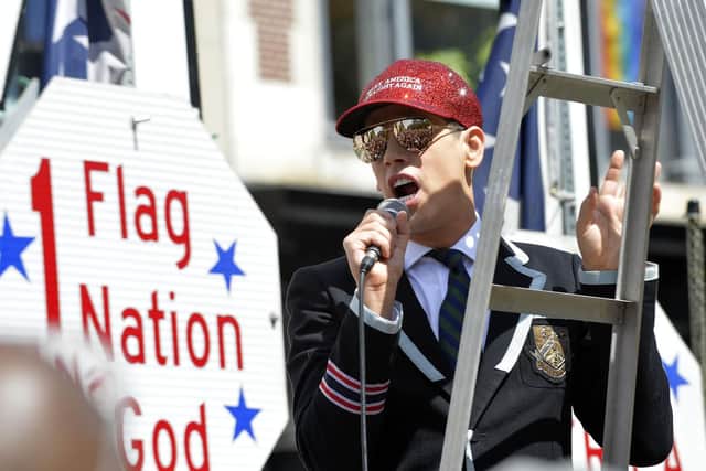 Controversial speaker Milo Yiannopoulos addressed the crowd during the march.