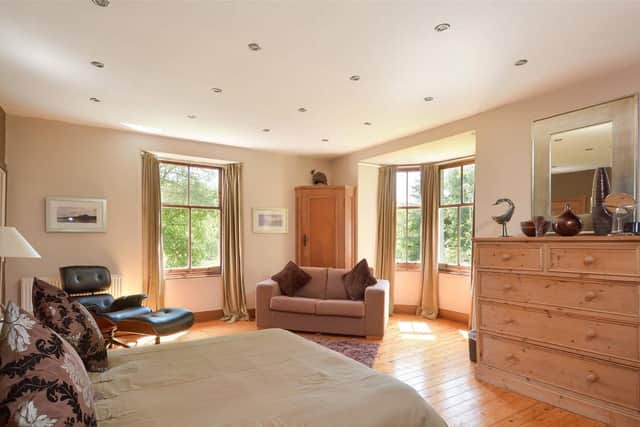 The light-filled master bedroom has an en suite shower room.