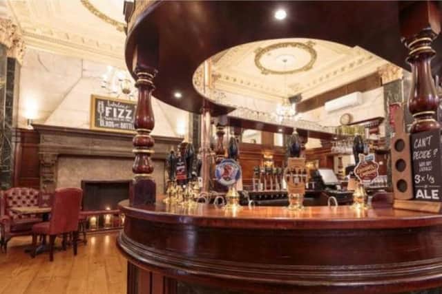 Located in a former bank, this pub serves local and national beers as well as food and a selection of spirits.
