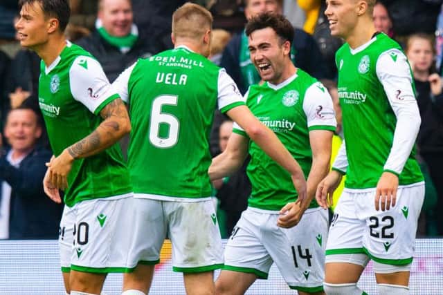 Hibs players celebrate after Stevie Mallan had opened the scoring.