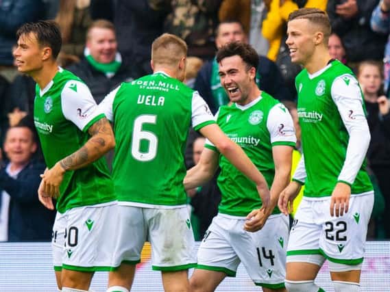 Hibs players celebrate after Stevie Mallan had opened the scoring.