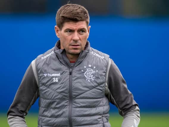 Steven Gerrard looks on at a Rangers training session at the Hummel Training Centre