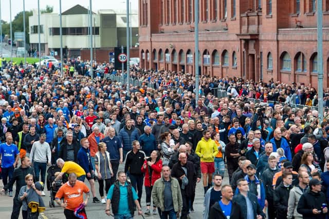 Thousands of Rangers supporters arrived to pay their respects.