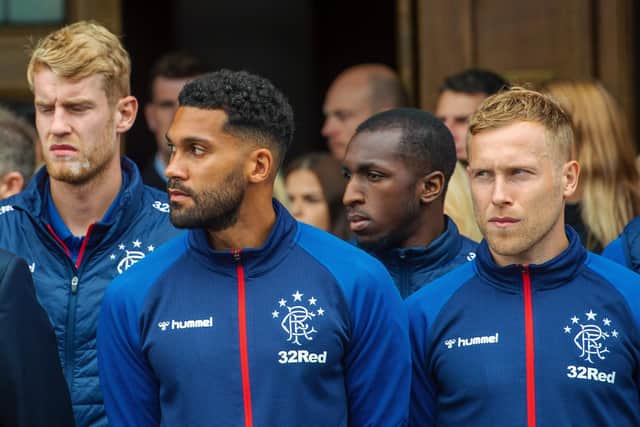 Rangers' Filip Helander, Wes Foderingham, Glen Kamara and Scott Arfield gather to pay tribute.