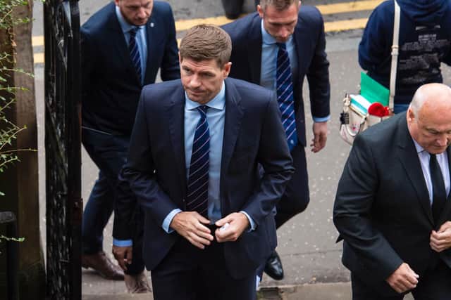 Rangers manager Rangers arrives for the funeral.