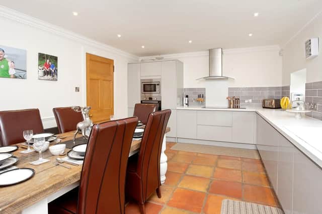 The spacious kitchen has a dining area and is sure to be the hub of the home.