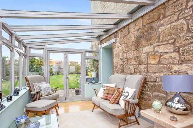 New owners can enjoy sunny days in the conservatory, which is located just off the living room.