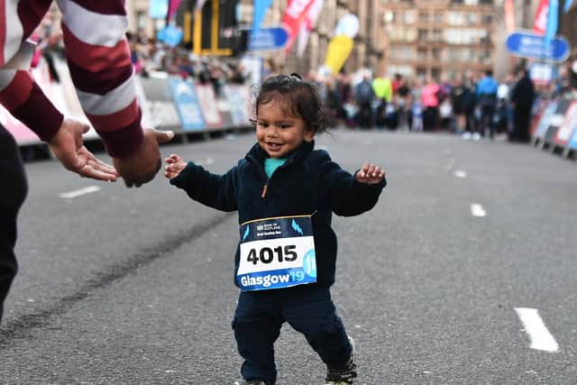 The Great Scottish Run festival got under way in George Square with the 100m toddler dash followed by the junior 2.5k and the 1-mile family run. Picture: John Devlin