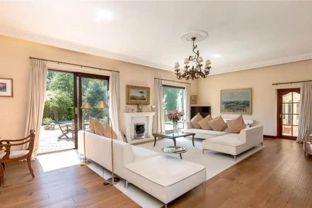 One of the reception rooms is a formal living room.