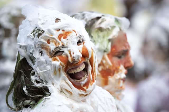 Hundreds of students have taken part in a mass foam fight as part of a ritual dating back centuries at Scotland's oldest university.