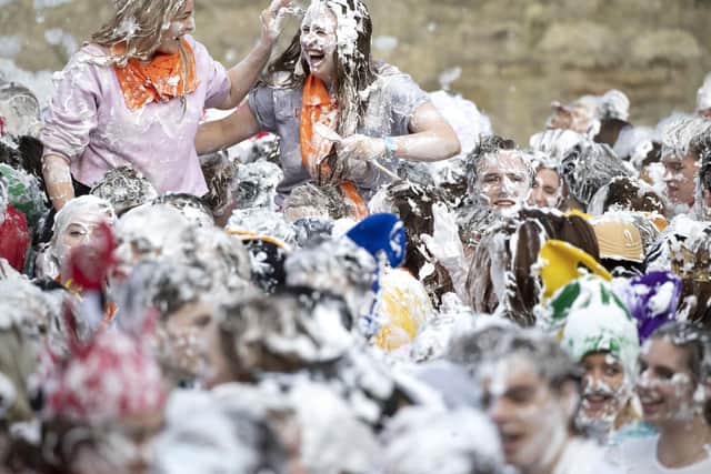 Raisin Monday is the culmination of a weekend of festivities when first-year students at the University of St Andrews say thank-you to their more senior student "parents" for mentoring them.
