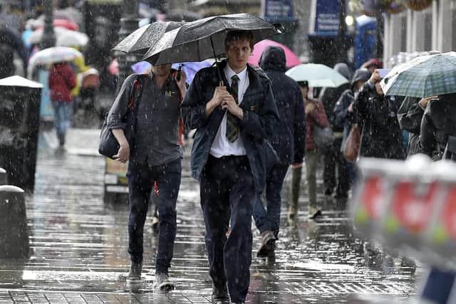 The Met Office has issued a yellow weather warning for rain in Scotland today, with certain areas set to see heavy downpours.
