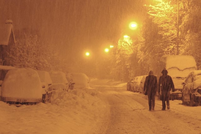 As the snow created havoc for drivers, many people chose to leave their vehicles behind and walk home the rest of the way. Location: Penicuik
