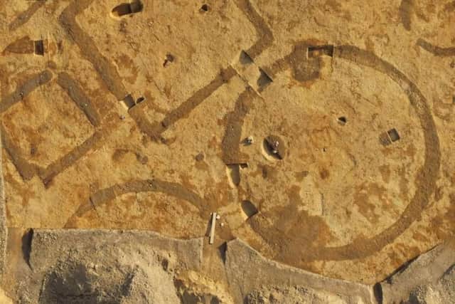 A 1,400-year- old skeleton was uncovered at a large Pictish cemetery at Muir of Ord which had been identified from an aerial photograph. PIC: Andy Hickie.