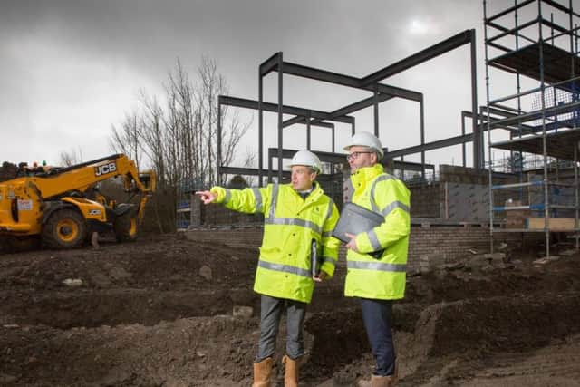 Swan Group's James Weal (left) and Derek Smith. Picture: Robert Perry