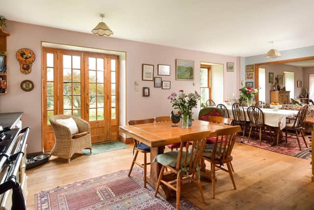 The living space comprises an open plan kitchen and dining area.