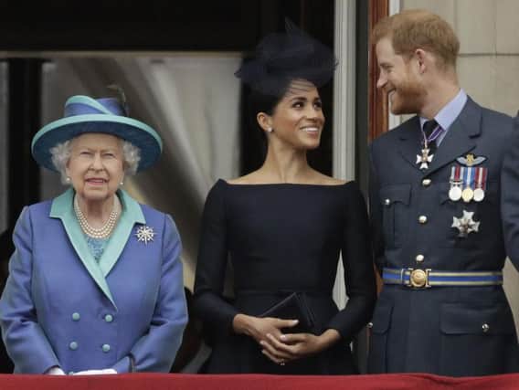 Queen has reportedly been smiling in her first appearance since Harry and Meghan chose to step away from their royal titles     picture: Matt Dunham