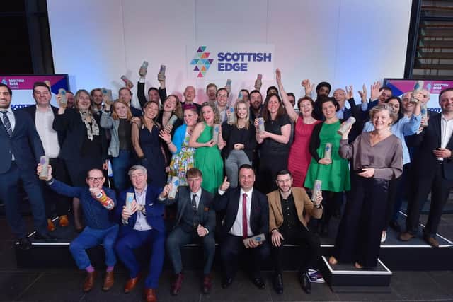 A group of previous winners of Scottish Edge - which has given out more than 15m to nearly 400 start-ups. Picture: Sandy Young.