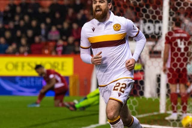 Liam Donnelly celebrates opening the scoring for Motherwell. Picture: SNS