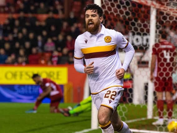 Liam Donnelly celebrates opening the scoring for Motherwell. Picture: SNS