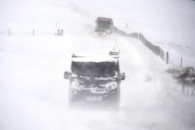 Stock image. Vehicle struggles through heavy snow in Dumfries and Galloway