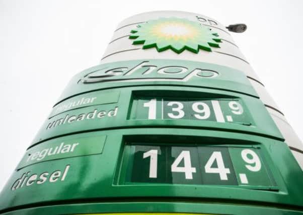 Scottish drivers are cutting back on non-essential trips because of rising fuel costs, a new poll claims. Picture: TSPL